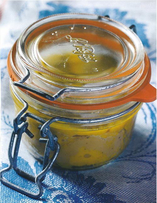 Jar of duck foie gras with fine sea salt